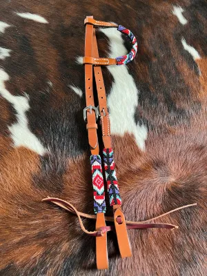 Beaded one ear headstall with southwest design black, red, blue, white, and turquoise in color.