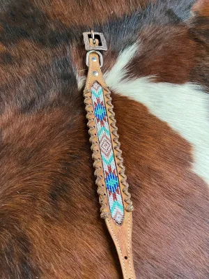 Genuine leather dog collar with white, teal, and burgundy navajo beaded inlay designa leather wrapped edge and copper hardware.