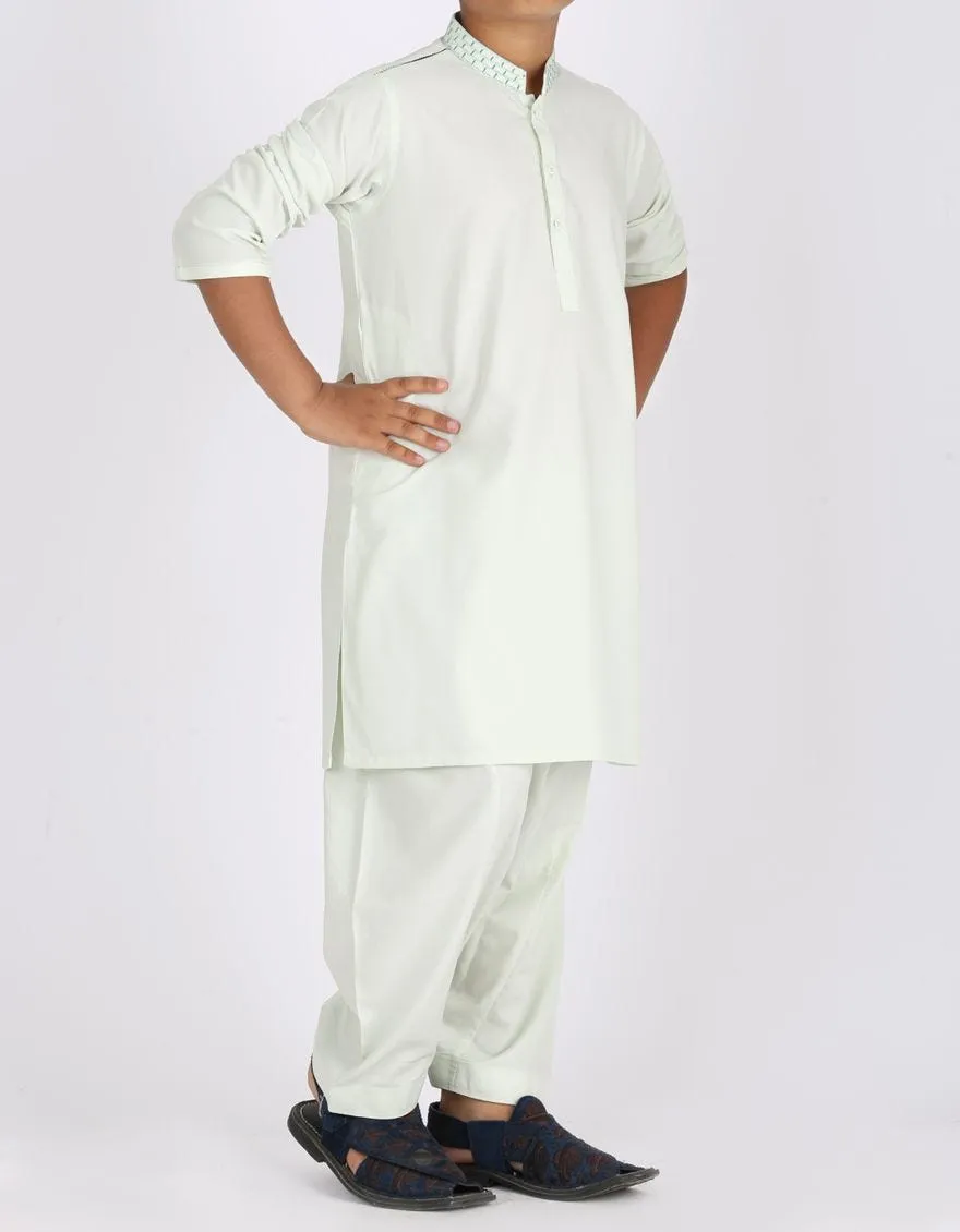 Pakistani machine embroidered dress in light green color # K2313